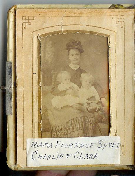 Granny Album Page 1.jpg - This is a very rare old photo of Lucy Florence Abbott (1864-1923) who was married to Henry Lewis Speed (1852-1917) in Denton County, Texas on August 24, 1877). She is holding her first two children, Clara Speed (1887-1888) and Charlie Speed (1885-1970). It is believed the photo was taken around 1888 near Denton County, Texas.